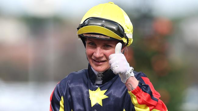 MELBOURNE, AUSTRALIA - NOVEMBER 02: Jamie Kah riding Goldrush Guru celebrates after winning Race 7 the Penfolds Victoria Derby during 2024 Penfolds Victoria Derby Day at Flemington Racecourse on November 02, 2024 in Melbourne, Australia. (Photo by Daniel Pockett/Getty Images)