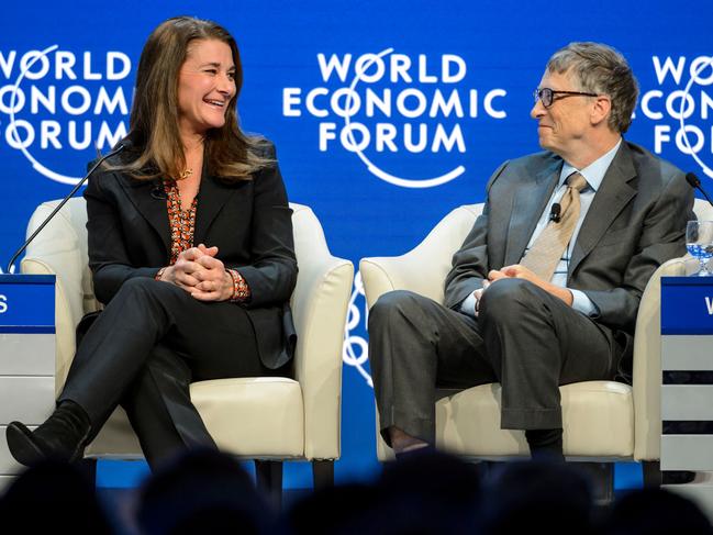 Bill Gates, right, raised eyebrows in his latest appearance since his split from wife Melinda. Picture: AFP