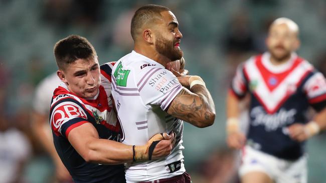 Radley makes that try-saving tackle on Dylan Walker. (Brett Costello)