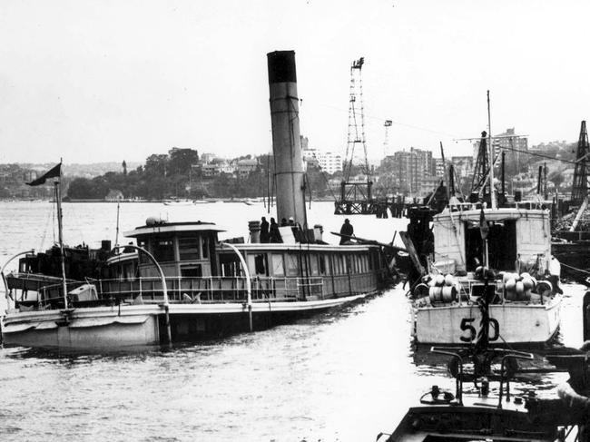 The Australian navy passenger ferry ship HMAS Kuttabul being raised in Sydney Harbour after it was sunk by Japanese midget submarine in 1942.