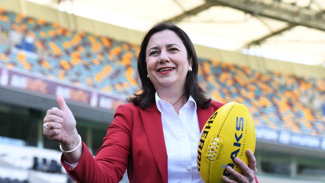 Annastacia Palaszczuk celebrates securing the AFL grand final. Picture: NCA NewsWire/Dan Peled