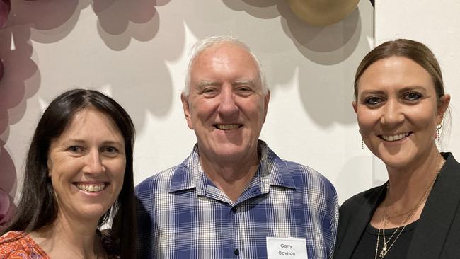 Cassandra Ranstrand, Garry Davison, and Leesa Porter celebrate the 50th anniversary of the Rainbows Rugby League Football Club at its golden jubilee at the Gympie Showgrounds Pavilion on the night of June 3, 2023.