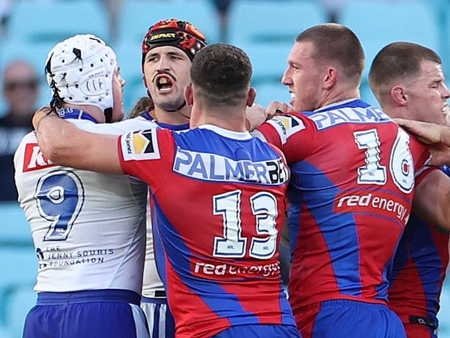 SYDNEY, AUSTRALIA - APRIL 21: Players scuffle during the round seven NRL match between Canterbury Bulldogs and Newcastle Knights at Accor Stadium, on April 21, 2024, in Sydney, Australia. (Photo by Mark Kolbe/Getty Images)