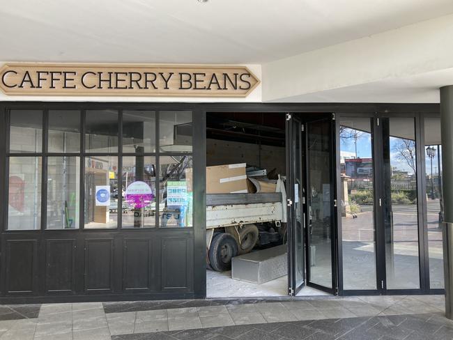 Construction workers dismantle Caffe Cherry Beans at Dubbo Square. Picture: Ryan Young