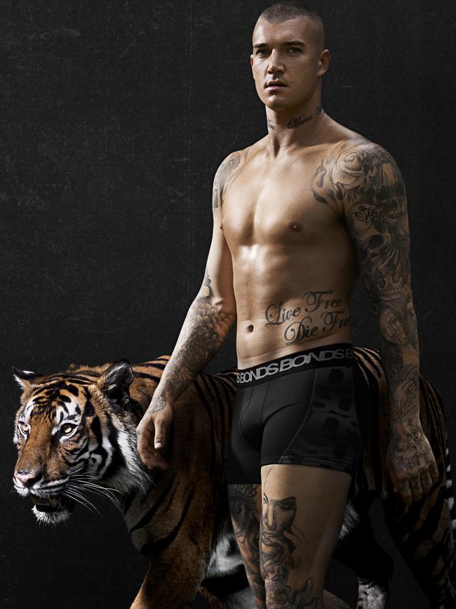 Richmond champion Dustin Martin and the tiger in his Bonds campaign. Picture: Bonds/supplied