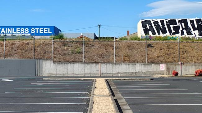 The anti-Elon Musk graffiti has since been painted over at the Derwent Park Tesla dealership. Picture: Caroline Tan