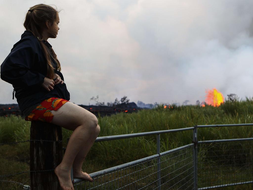 Some residents are staying put, despite the U.S. Geological Survey saying the volcano is launching plumes up to 30,000 feet into the sky. Mario Tama/Getty Images/AFP