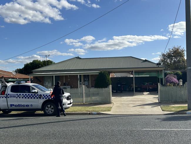 Police at the Campbell St home of Emma Bates, where her body was found. Picture: Oscar Jaeger