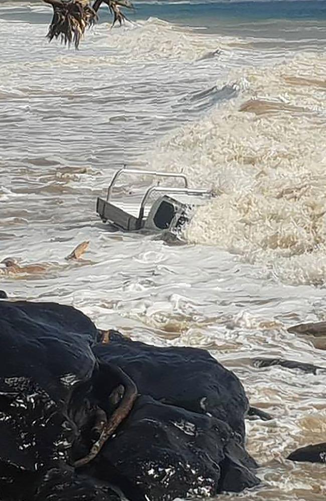 A ute was swept away at Rainbow Beach on Tuesday. Picture: AFP/Rainbow Beach Towing