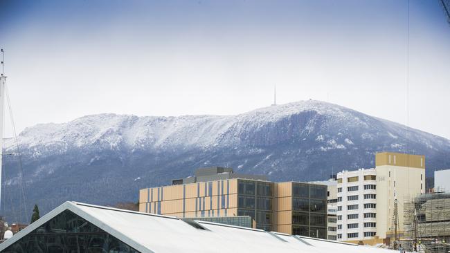 Mt Wellington / kunyani with snow on it, with Brook St Pier in the forground. Picture: Richard Jupe