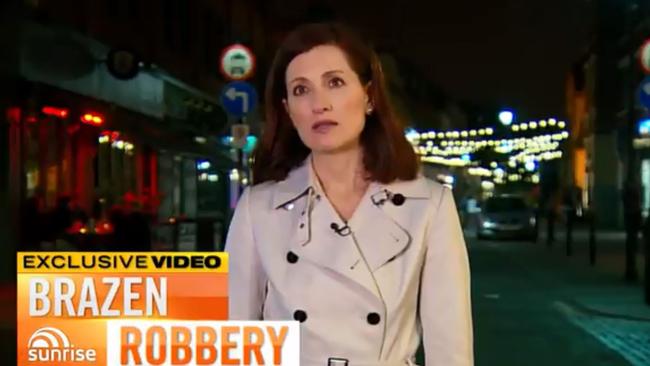 Sunrise reporter Laurel Irving is forced to stop her live cross.