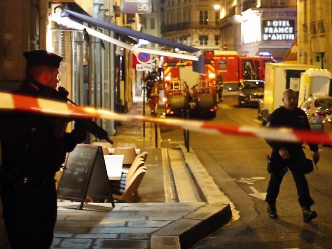 Police officers at the scene. Picture: AP/Thibault Camus