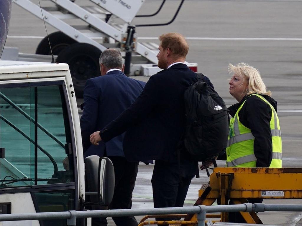 Prince Harry, Duke of Sussex boards a flight at Aberdeen Airport on September 9, 2022 in Aberdeen, United Kingdom after his grandmother Queen Elizabeth II died at Balmoral Castle in Scotland on September 8, 2022. Picture: Peter Summers/Getty Images.