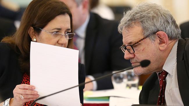 Queensland Premier Annastacia Palaszczuk speaking with her ex-chief of staff David Barbagallo. (AAP Image/Jono Searle)