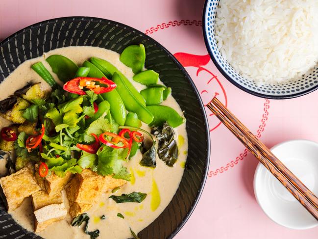 Mr Good Guy’s Thai green curry is served with a bowl of creamy curry sauce topped with crisp tofu cubes, green beans, eggplant, thick slices of meaty king brown mushrooms. Picture: Olivia Sattler