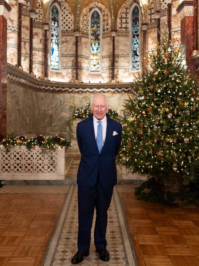 King Charles smiles as he prerecords his Christmas message. Picture: Pool/AFP