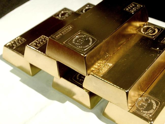 Sydney, March 27, 2003. Gold ingots on display at the Australian Stock Exchange. In a joint initiative with the World Gold Council, Gold Bullion Ltd has developed a new type of investment that enables investors to buy and sell gold bullion through the stock exchange. (AAP Image/Mick Tsikas) NO ARCHIVING