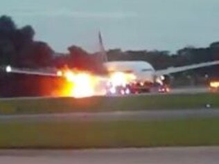 Plane catches fire on runway