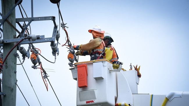 A TasNetworks crew working to restore power. Picture: TasNetworks