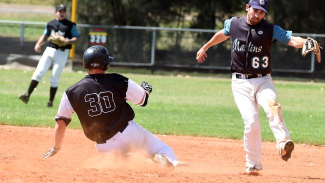 Chris Jolly slides into base for Penrith. (Matt Sullivan)