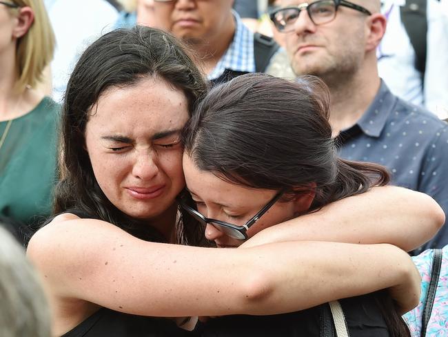 Mourners at the Federation Square memorial. Picture: Jake Nowakowski