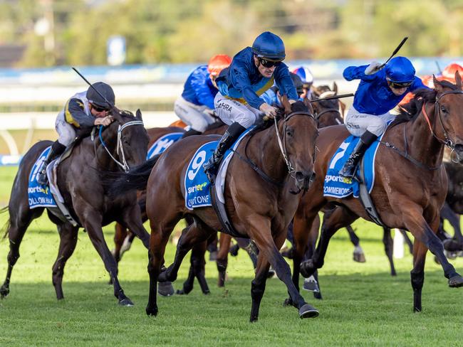 Charm Stone takes control of the Robert Sangster Stakes. Photo: Makoto Kaneko.