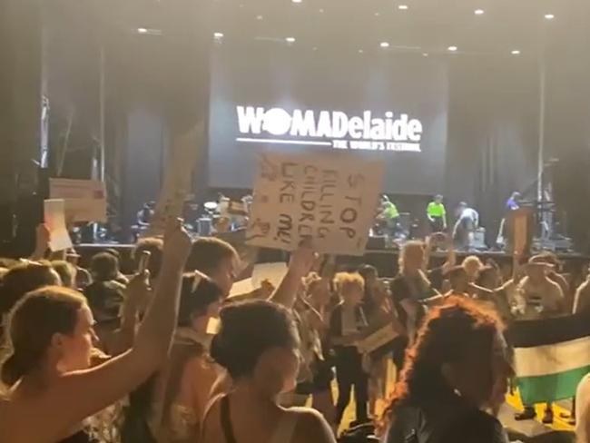 WOMADelaide now: Protest circle at the end of Ziggy Marley concert. Clearly more than 100 people. Lots of other little groups. Very effective protest.