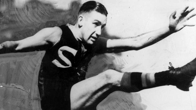 Ken Farmer during his playing days. The late North Adelaide champion will be immortalised in a bronze statue at Adelaide Oval.