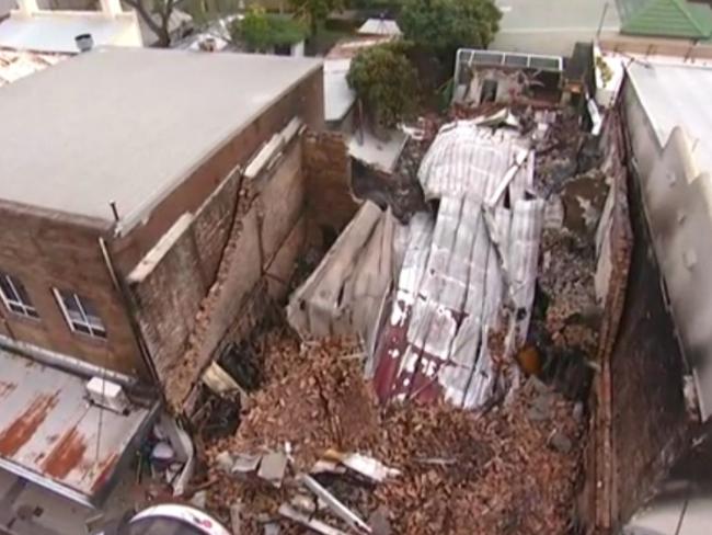 The destroyed building where three people were killed. Picture: NSW Fire & Rescue