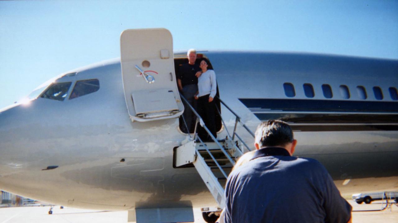 Bill Clinton and Ghislaine Maxwell pose together for the camera as the pair prepare to board Jeffrey Epstein’s jet. Picture: MEGA TheMegaAgency.com