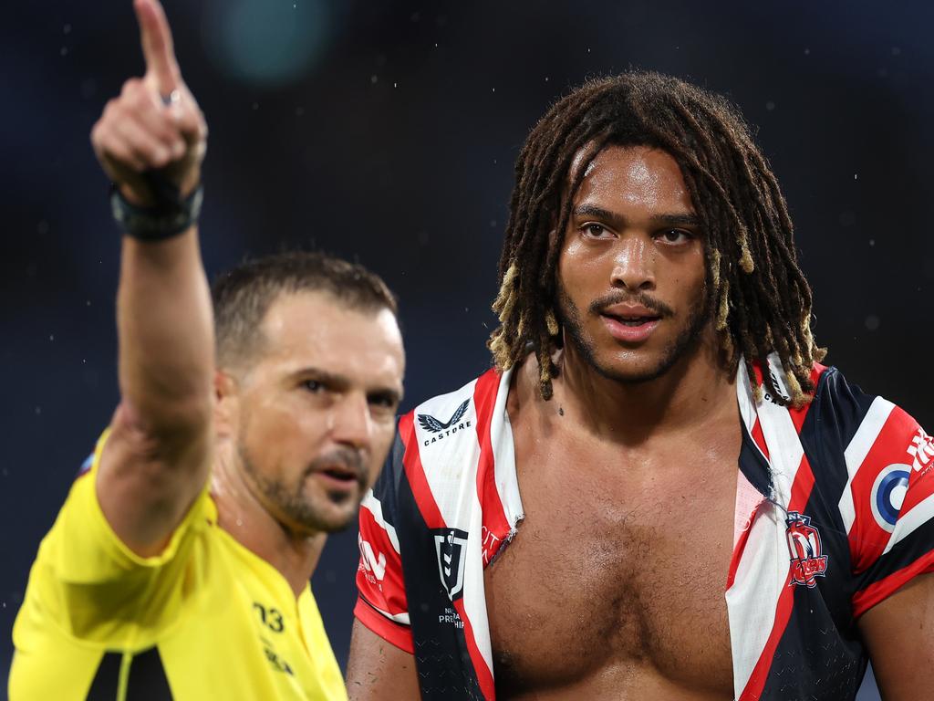 Dom Young of the Roosters is sent off by referee Grant Atkins after a high tackle on Blake Taaffe. Picture: Cameron Spencer/Getty Images