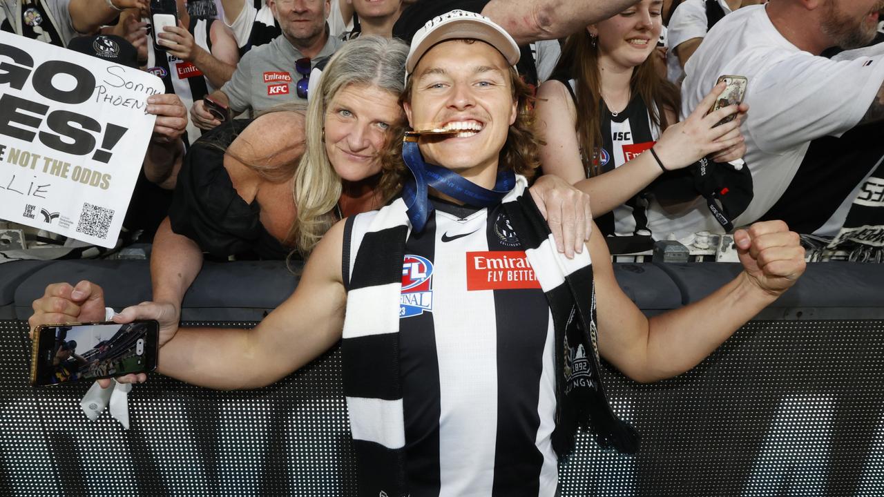 MELBOURNE, AUSTRALIA - SEPTEMBER 30: Jack Ginnivan of the Magpies poses with his Premiership Medal after the 2023 AFL Grand Final match between Collingwood Magpies and Brisbane Lions at Melbourne Cricket Ground, on September 30, 2023, in Melbourne, Australia. (Photo by Darrian Traynor/AFL Photos/via Getty Images)