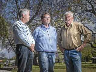 David Bancroft, Richie Williamson and Bryan Robins look over the Cowper Memorial at See Park in preparation for the 30th anniversary of the Cowper Bus Crash. Picture: Adam Hourigan