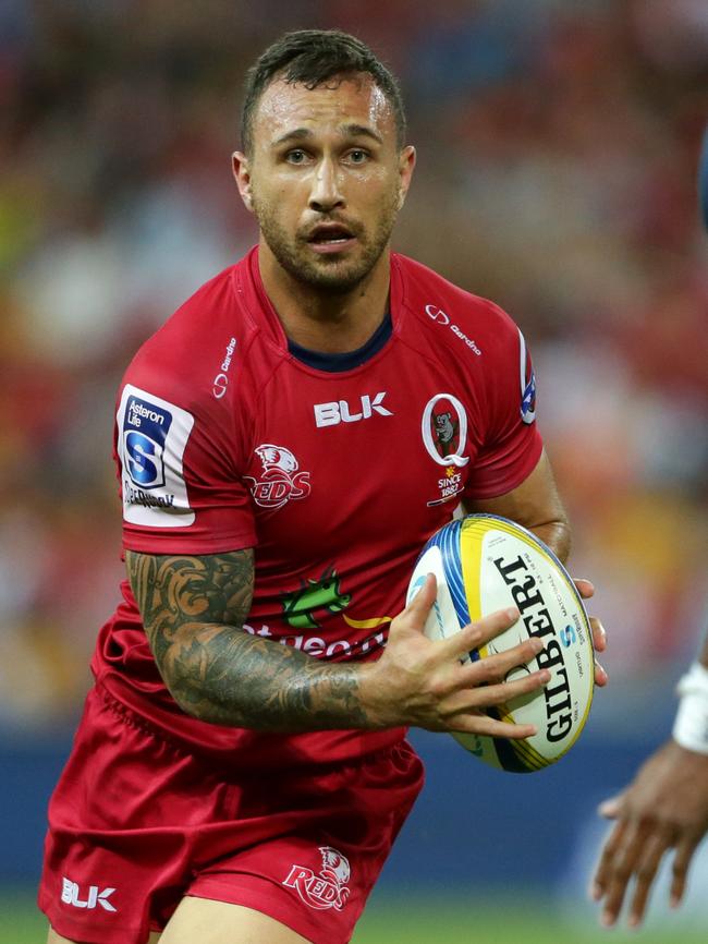 Quade Cooper of the Reds in action.