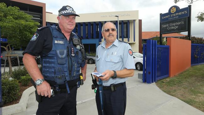 Police Acting Inspector Tony Wormald and Ambulance Senior Operations Supervisor Patrick Berry at St Stephens College in Coomera after seven students were rushed to hospital after a suspected drug overdose. Picture Glenn Hampson