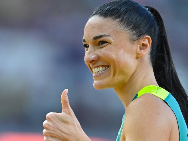 BUDAPEST, HUNGARY - AUGUST 22: Michelle Jenneke of Team Australia reacts after the Women's 100m Hurdles Heats during day four of the World Athletics Championships Budapest 2023 at National Athletics Centre on August 22, 2023 in Budapest, Hungary. (Photo by Hannah Peters/Getty Images)