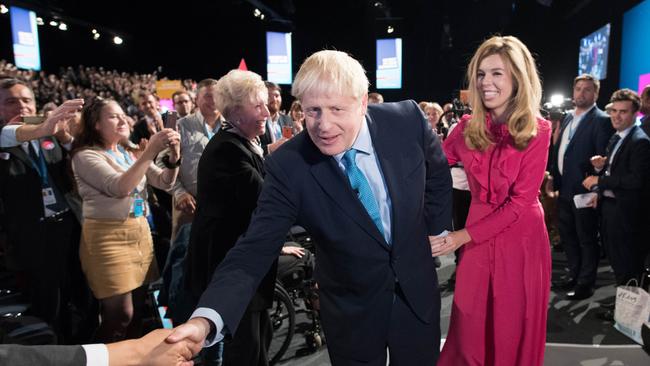 Mr Johnson’s girlfriend, Carrie Symonds, was there to watch his keynote speech. Picture: Stefan Rousseau/Getty Images