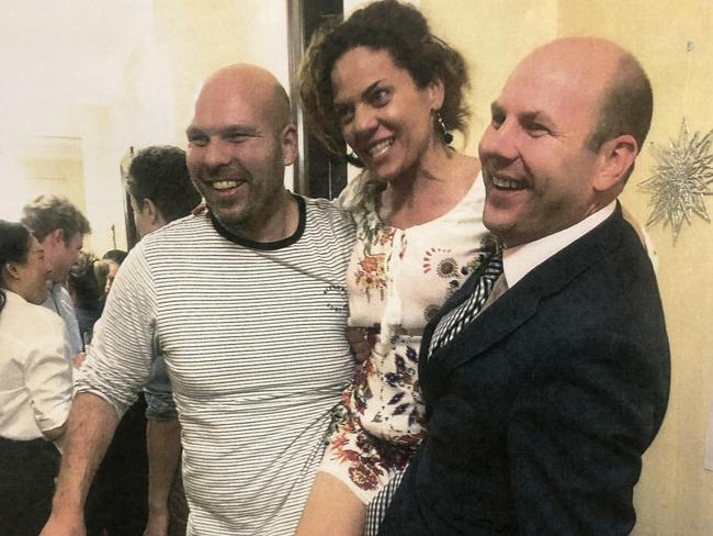 The photo on Ms Bonaros’ phone where she claimed she was hoisted up by Mr Duluk (right) and Labor MLC Justin Hanson (left) at the Christmas party. Picture: Supplied