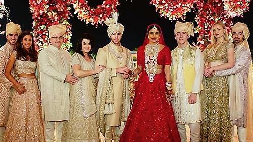 Nick and Priyanka Chopra flanked by family at their wedding ceremony in India in December. (Picture: Instagram)