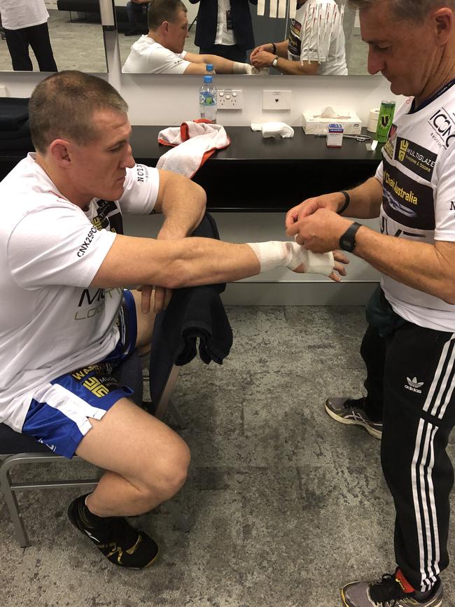 Paul Gallen gets his hands wrapped by cutman Brian Willmot.