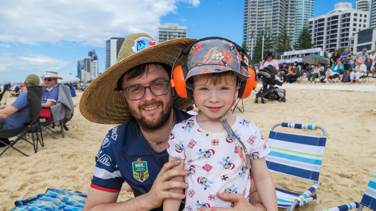 Scott and Jace Shackow enjoying the inaugural Pacific Air Show over Surfers Paradise. Picture: Glenn Campbell