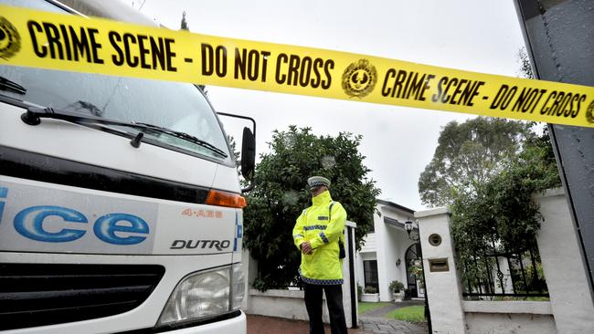 Police outside Li’s home on Lockwood Rd, Burnside, following the discovery of his mother’s body. Picture: Tricia Watkinson