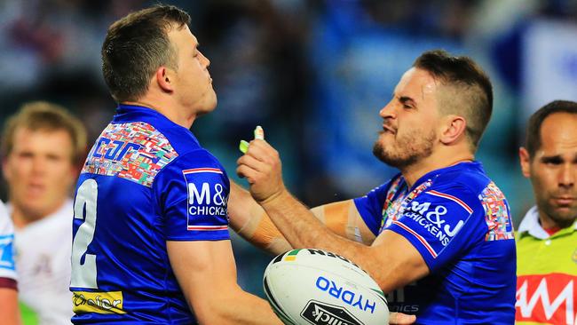 Brett Morris (L) of the Bulldogs celebrates a try with Josh Reynolds. Picture: Mark Evans