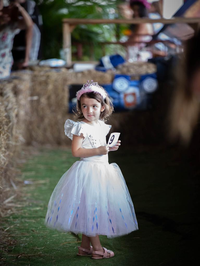 Croc racing at the Berry Springs Tavern for Melbourne Cup Day: Shayla Holmes, 4, takes part in the ‘Fashions in the Bush’ event. Picture: GLENN CAMPBELL