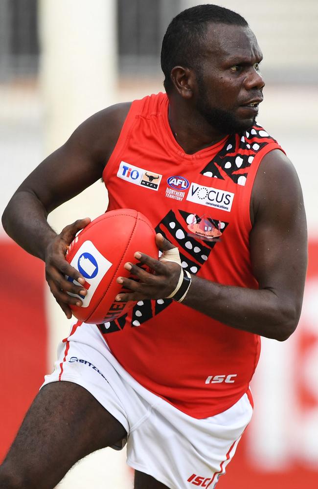 Simon Munkara spins towards goal in a pose that has transpired through several seasons as an original Tiwi Bomber. Picture: AFLNT/Media