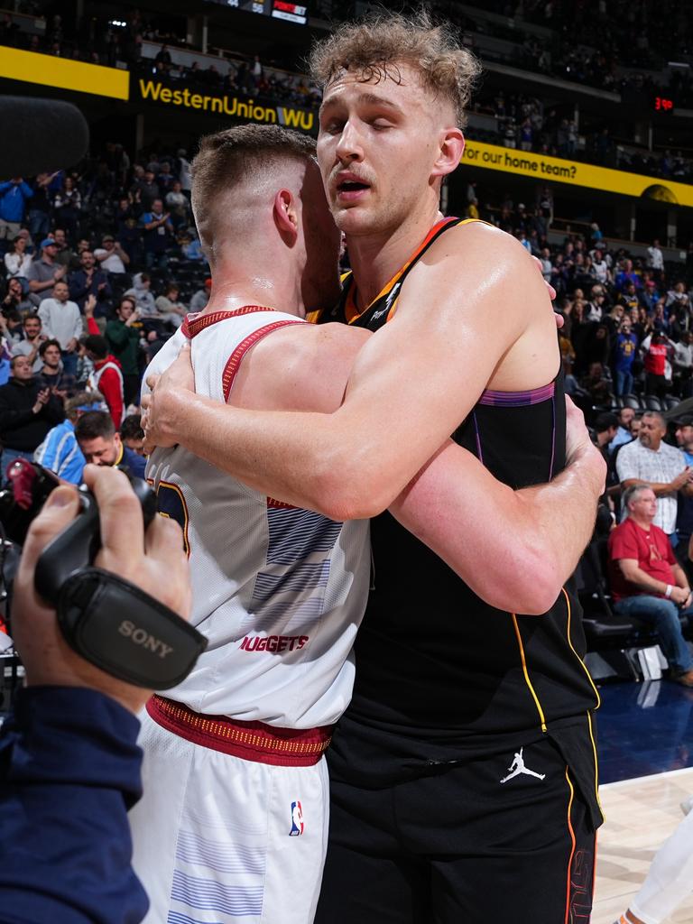 White and Landale catch up in the big league. Picture: NBAE/Getty Images