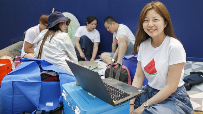 Reveller, Esther Horng, 31, is camping out near the Art Gallery of NSW, almost 48 hours before the big NYE celebrations. Photo: Tim Pascoe