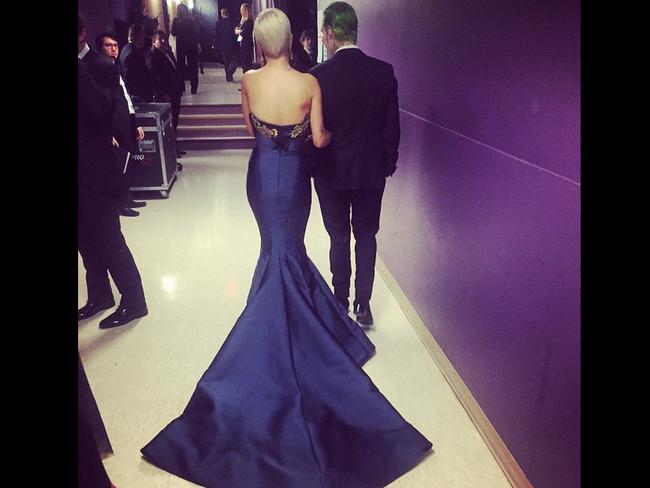 Rita Ora at the Oscars 2015 via Instagram, “Here we go. BTS #Oscar2015”