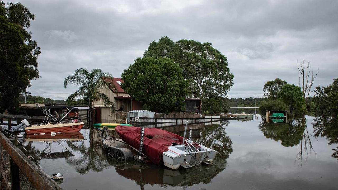 A flooded backyard of a house in Windsor, NSW. Picture: NCA NewsWire / Flavio Brancaleone