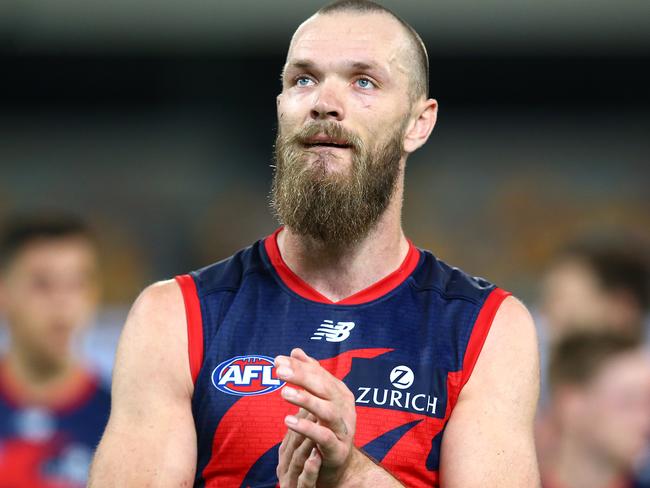 BRISBANE, AUSTRALIA - SEPTEMBER 12: Max Gawn of the Demons celebrates the win with his team after the round 17 AFL match between the Greater Western Sydney Giants and the Melbourne Demons at The Gabba on September 12, 2020 in Brisbane, Australia. (Photo by Jono Searle/AFL Photos/via Getty Images)